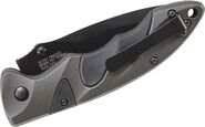 Schrade Zwart AUS-8 Lemmet, AK Kleur Aluminium Handvat met Zwarte Inzetstukken, Duimstuds, Sure-Lock - KNIFESTOCK